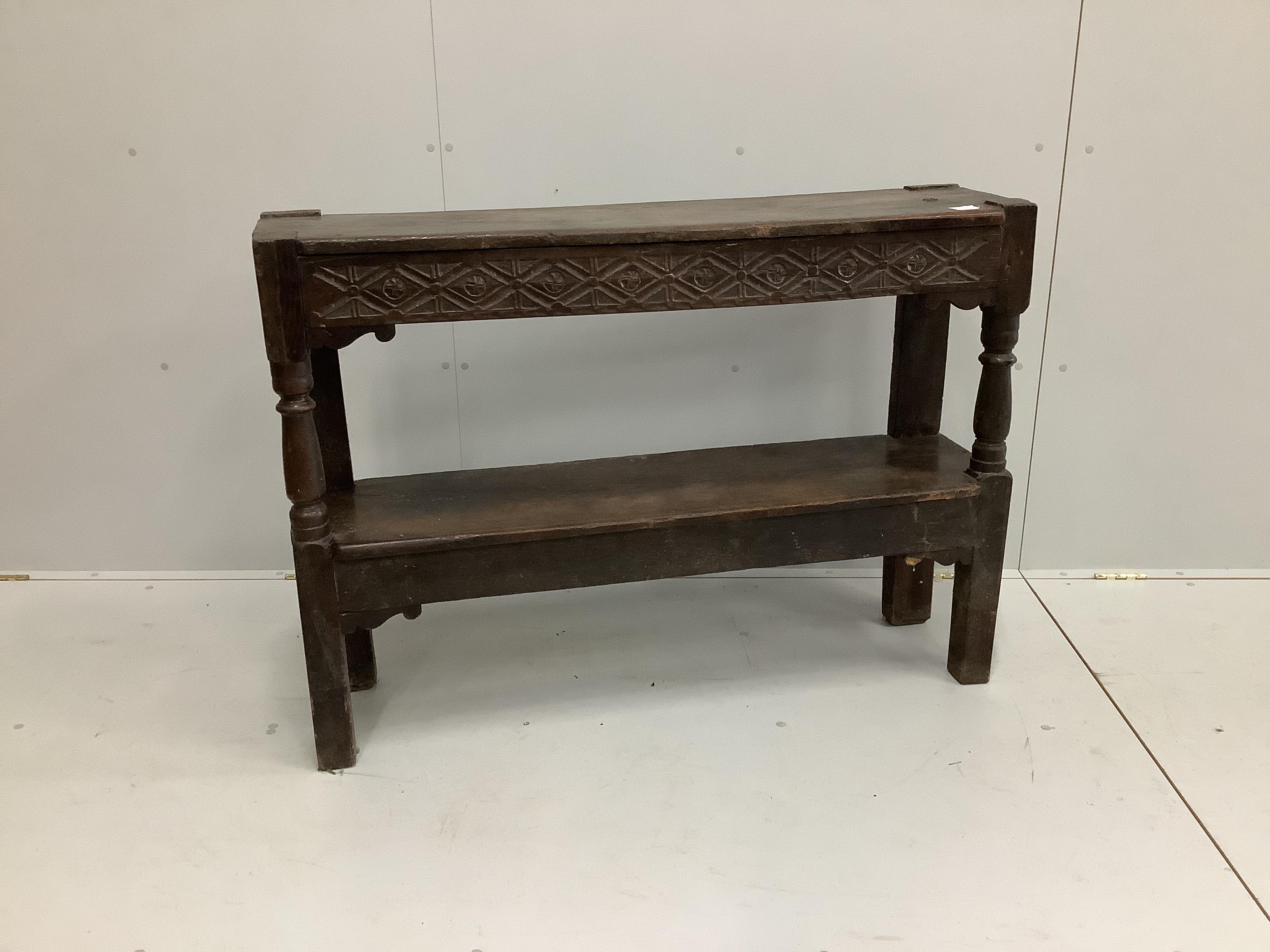 An 18th century oak two tier buffet (likely lacking higher tier), width 119cm, depth 31cm, height 84cm